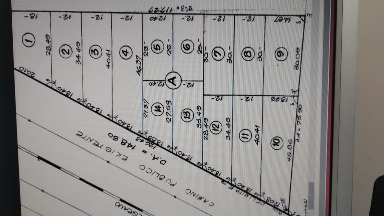 Bº Los Paraísos - Calle Los Jacarandaés entre Los Alamos y Los Olmos