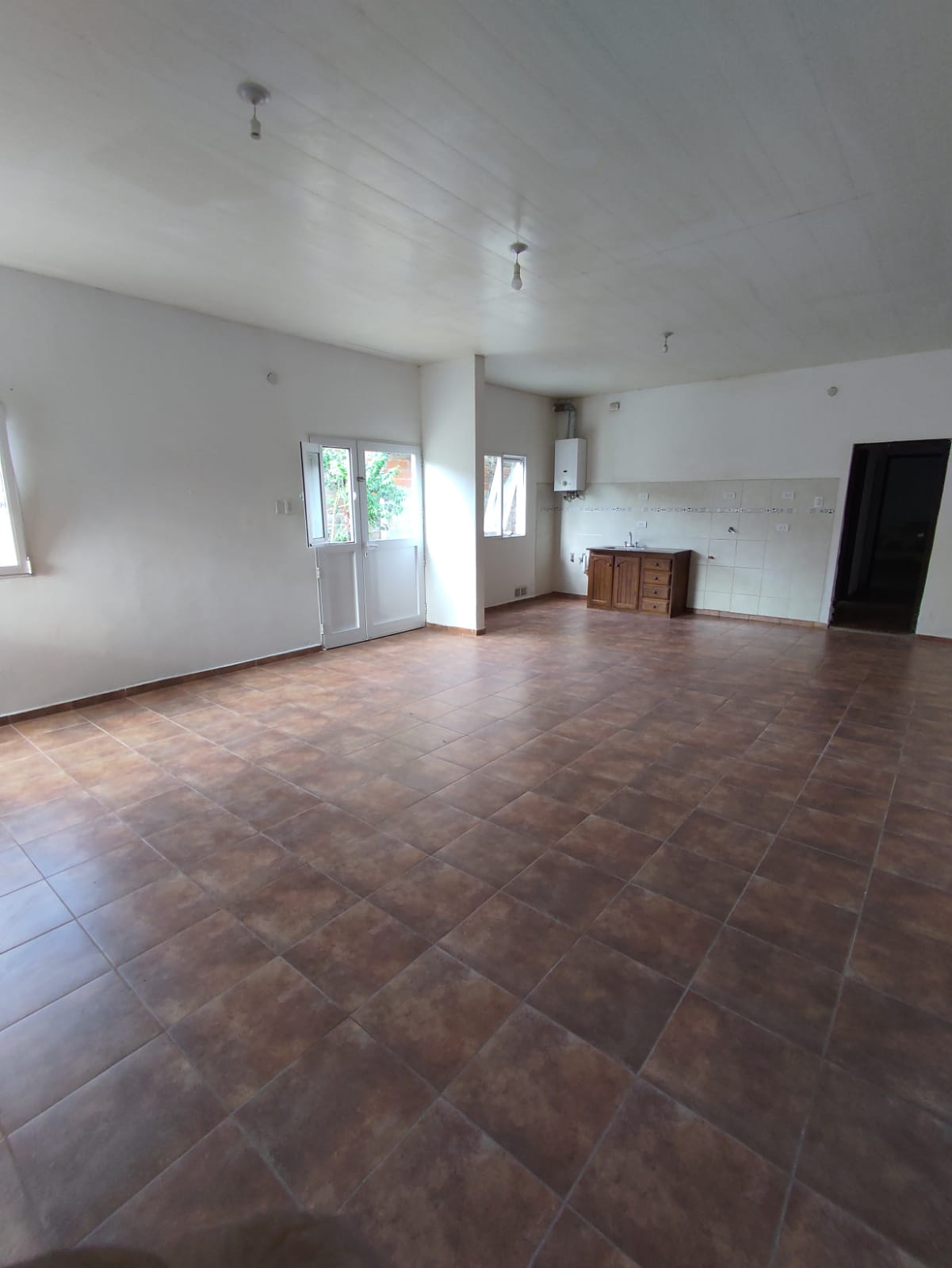 Juan de Garay 2375 con  Hip. Irigoyen